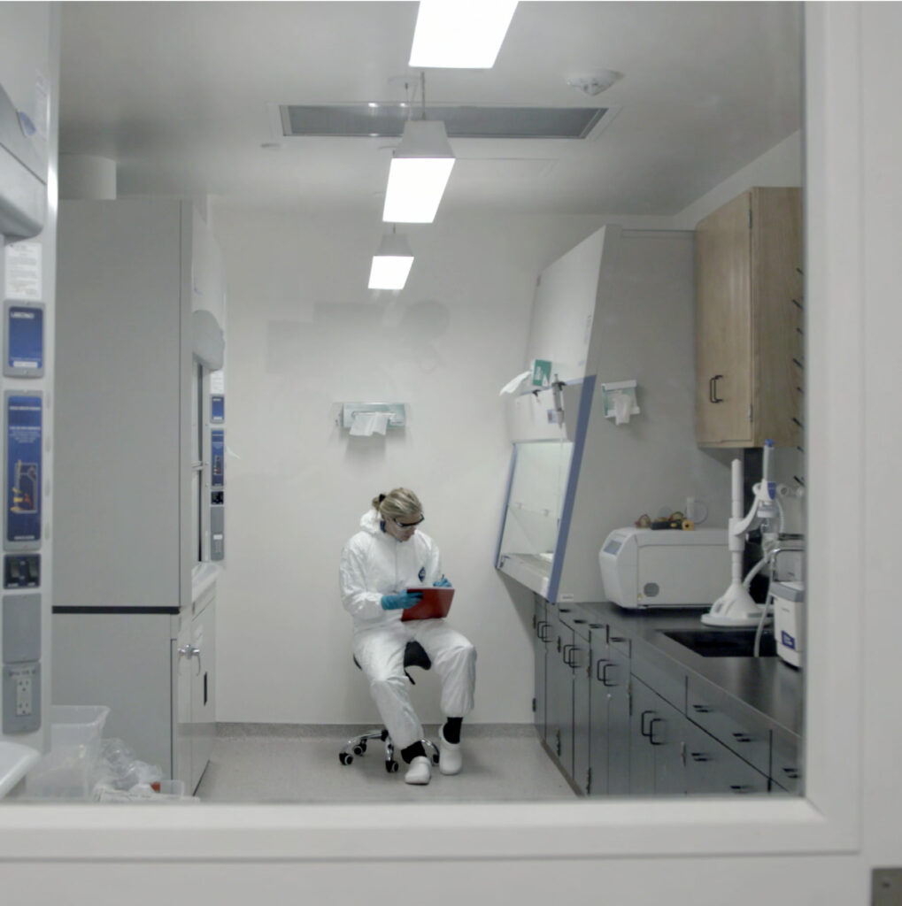 Image of scientist at work.